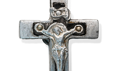 Modern photograph of a pewter crucifix pendant